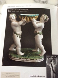 A polychrome faience group with two Bacchus figures, Geo Martel, D&egrave;svres, early 20th C.