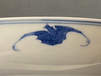 A pair of Chinese blue and white 'cranes, bagua and dragon' plates, Guangxu mark and of the period