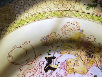 A fine Chinese famille rose plate with a lady and three boys, Yongzheng