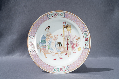 A fine Chinese famille rose ruby back plate with figures in an interior, Yongzheng