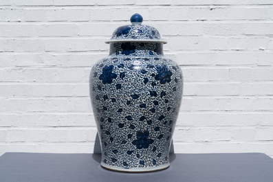 A large Chinese blue and white 'peony scrolls' vase and cover, Kangxi