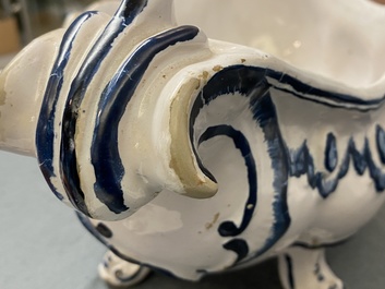 A blue and white Brussels faience rocaille tureen and cover, 18th C.