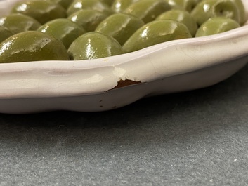 Un plat en fa&iuml;ence &agrave; d&eacute;cor trompe-l'oeil d'olives, Moustiers, France, 18&egrave;me
