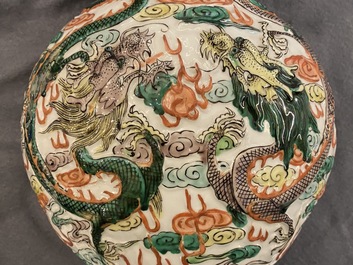 A Chinese famille verte relief-moulded double gourd 'dragon' vase on wooden stand, 19/20th C.