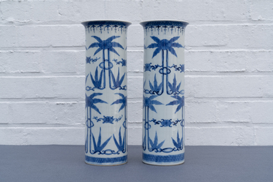 A pair of Chinese famille rose and a pair of blue and white vases, 19th C.