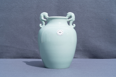 A Chinese monochrome dragon-handled celadon vase, Qianlong mark, 19/20th C.