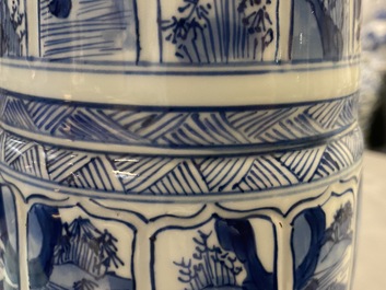 A Chinese blue and white 'gu' vase with landscape panels, Kangxi