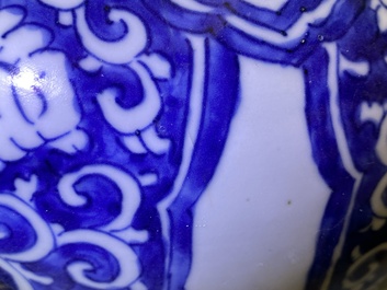 A Chinese blue and white vase with floral panels, Kangxi
