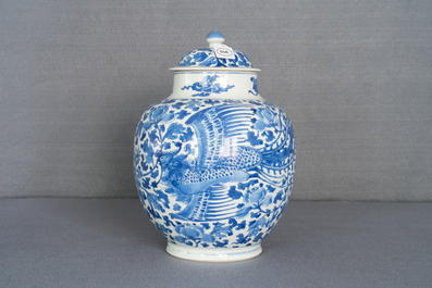 A Chinese blue and white vase and cover with phoenixes, Kangxi