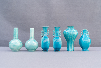 Eleven monochrome Chinese porcelain and Beijing glass vases, Kangxi and later