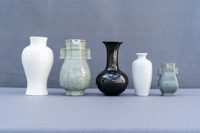 Eleven monochrome Chinese porcelain and Beijing glass vases, Kangxi and later