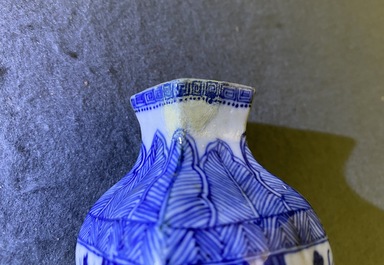 A pair of square Chinese blue and white covered vases and a tea caddy, Kangxi