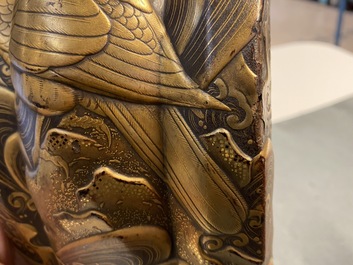A Japanese gilt-lacquered 'kura' saddle with matching 'abumi' stirrups, Muromachi, 16th C.