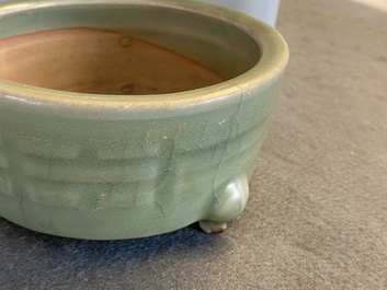 A Chinese Longquan celadon tripod censer with trigrams, Ming