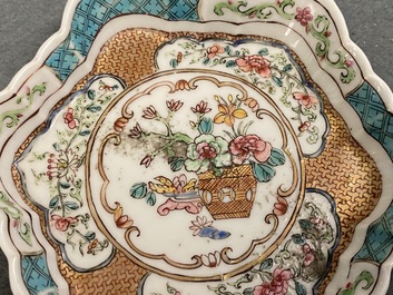 Three Chinese famille rose teapot stands, two spoon trays and a saucer, Yongzheng/Qianlong