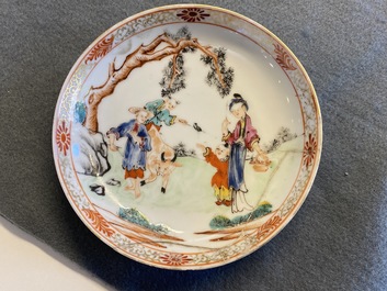 Seven Chinese famille rose 'Mandarin' cups and saucers, Qianlong