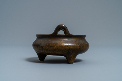 A Chinese bronze tripod censer, seal mark, 17/18th C.