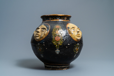 A relief-decorated papier-m&acirc;ch&eacute; vase with four faces, Kashmir, India, 19th C.