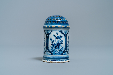 A Dutch Delft blue and white caster, 18th C.