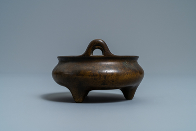 A Chinese bronze tripod censer, seal mark, 17/18th C.