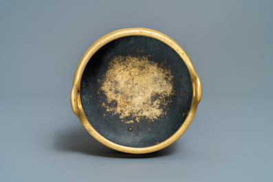 A Chinese gilt bronze tripod censer, Xuande mark, 19/20th C.