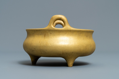 A Chinese gilt bronze tripod censer, Xuande mark, 19/20th C.
