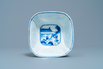 A Chinese blue and white bowl with a lady with cat, Kangxi mark and of the period