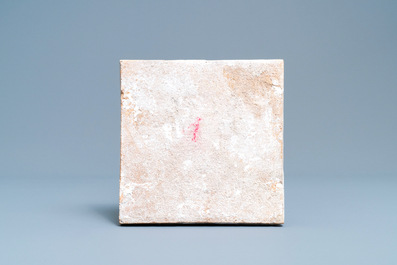 A polychrome Dutch Delft tile with a bird in flight, 17th C.