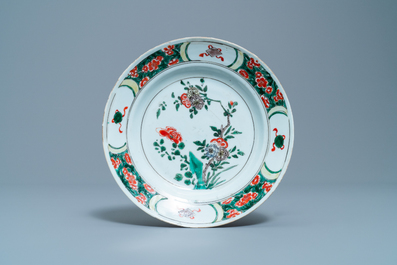 Two Chinese famille verte cup stands, a teapot and a plate, Kangxi