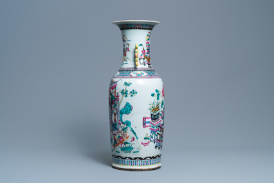 A Chinese famille rose vase with figures and antiquities, 19th C.