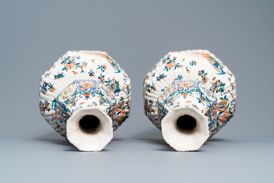 A pair of exceptional large ribbed Dutch Delft cashmere palette vases with flower vases, ca. 1700