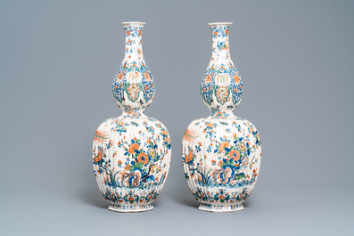 A pair of exceptional large ribbed Dutch Delft cashmere palette vases with flower vases, ca. 1700