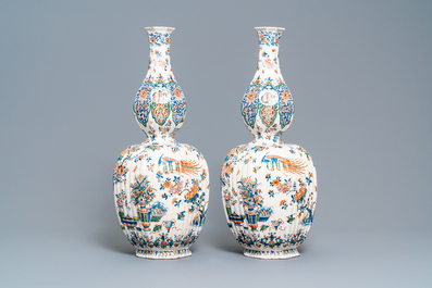 A pair of exceptional large ribbed Dutch Delft cashmere palette vases with flower vases, ca. 1700