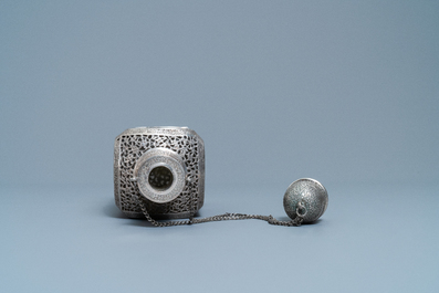 A reticulated Qajar silver flask with glass insert, Iran, 19th C.