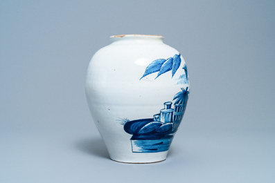 A Dutch Delft blue and white tobacco jar with an American indian, 18th C.