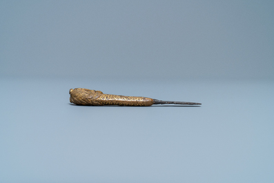 A Sino-Tibetan gilt bronze knife handle in the shape of a horse, Ming