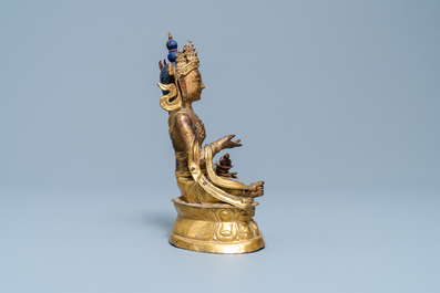 A Sino-Tibetan gilt copper alloy figure of Buddha, 18/19th C.