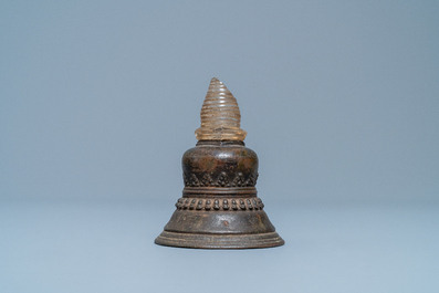 A bronze stupa with rock crystal yasti, Tibet, 18th C.