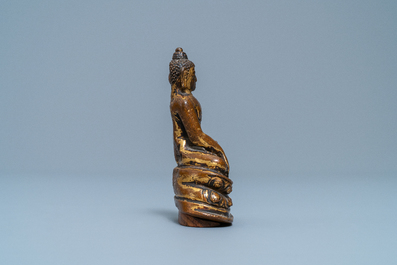 A Sino-Tibetan gilt bronze figure of Buddha Shakyamuni, Ming