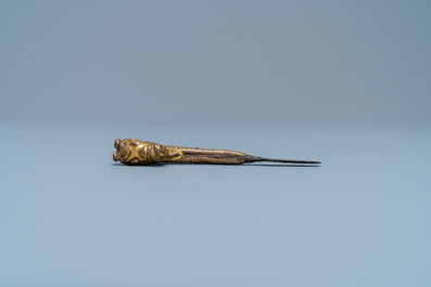 A Sino-Tibetan gilt bronze knife handle in the shape of a horse, Ming