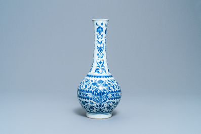 A Chinese blue and white 'phoenix medallion' bottle vase, Transitional period