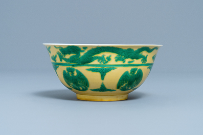 An imperial Chinese green and yellow enamelled 'dragon and phoenix' bowl, Kangxi mark and of the period