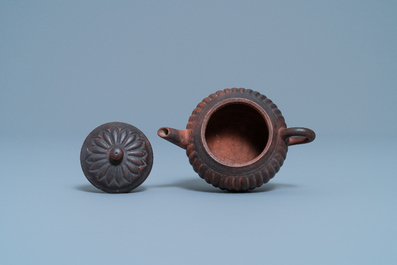 A Chinese Yixing stoneware 'chrysanthemum' teapot and cover, seal mark, Qianlong