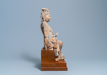A Chinese painted wooden figure of Guanyin, Ming