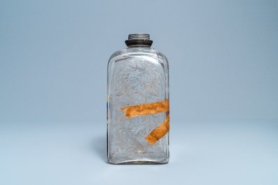 Une bouteille de marriage armori&eacute;e et dat&eacute;e 1723 en verre, Flandres ou Pays-Bas