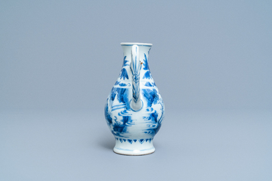 A Chinese blue and white ewer with figures in a landscape, Transitional period