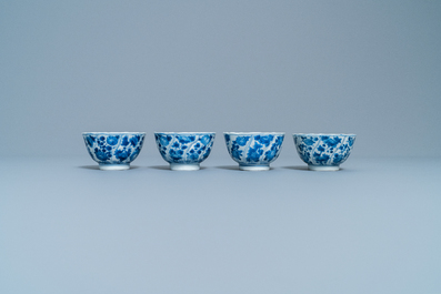 Four Chinese blue and white cups and saucers and three large cups, Kangxi/Qianlong