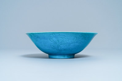 A Chinese turquoise-glazed bowl with floral underglaze design, Kangxi