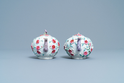 A pair of Chinese famille rose relief-decorated teapots with floral design, Yongzheng