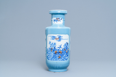 A Chinese blue, white and copper red lavender blue-ground rouleau vase, 19/20th C.